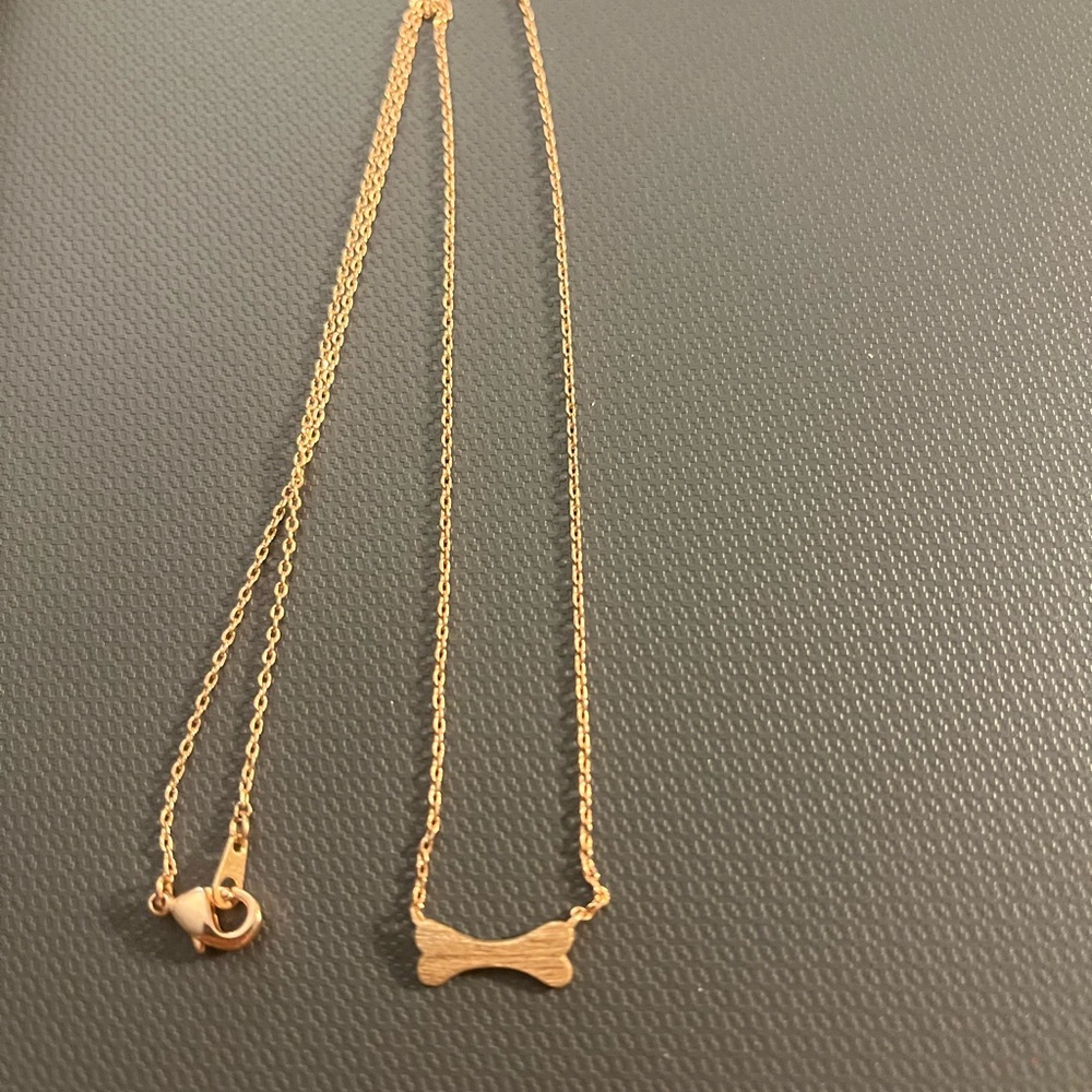 Gold Bone Pendant Necklace